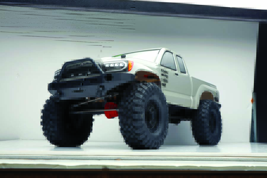 High-clearance replica Demello Offroad front and rear bumpers provide Base Camp with better approach and departure angles.