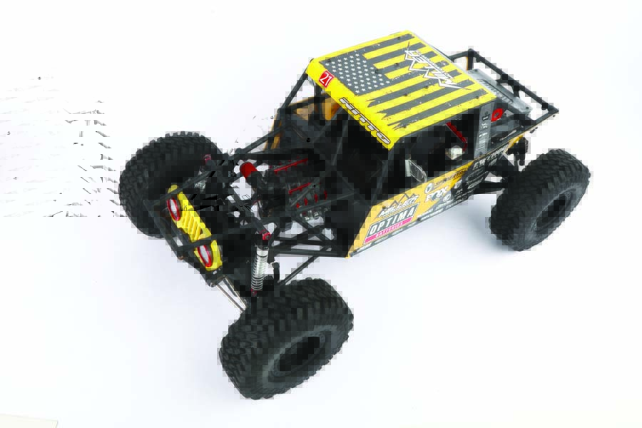 “The molded Lexan body panels not only add to the aesthetic appeal but also contribute to the durability of this RC rock racer.“