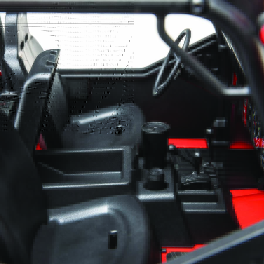 The CJ-7’s interior is highly detailed, so much so that it includes a removable drinking tumbler and beverage can in its cupholders.
