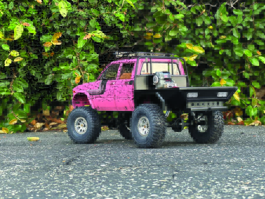 This Castle Creations Mamba X ESC was custom Cerakoted pink by Rusty’s Kustoms to match the rig’s body. Laser-etched logos were applied by Pdub Graphics.