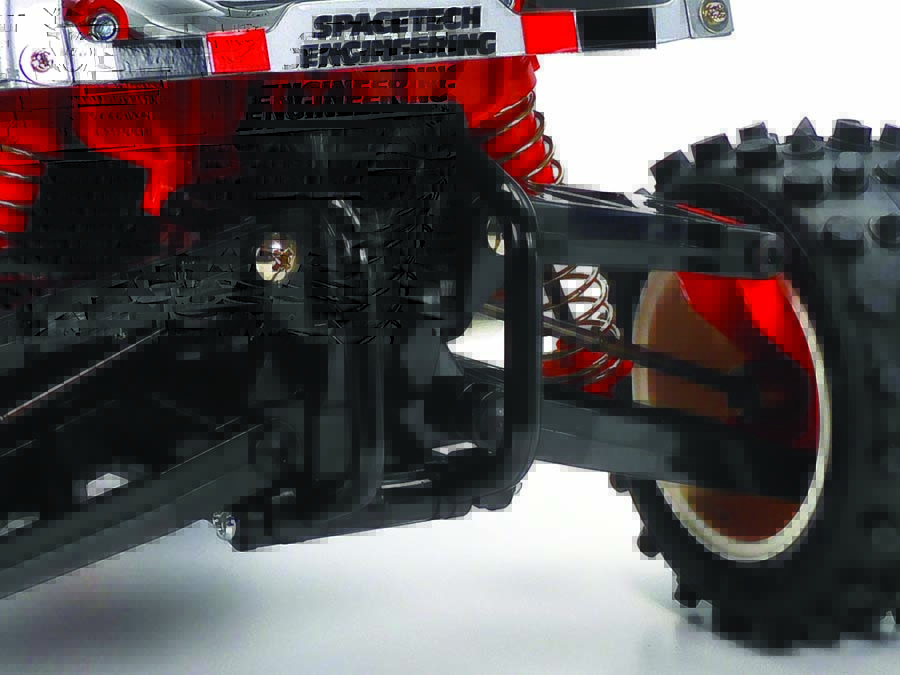Super Sabre features wide H-arms at the rear along with dual CVA oil dampers and dog bone drive shafts.