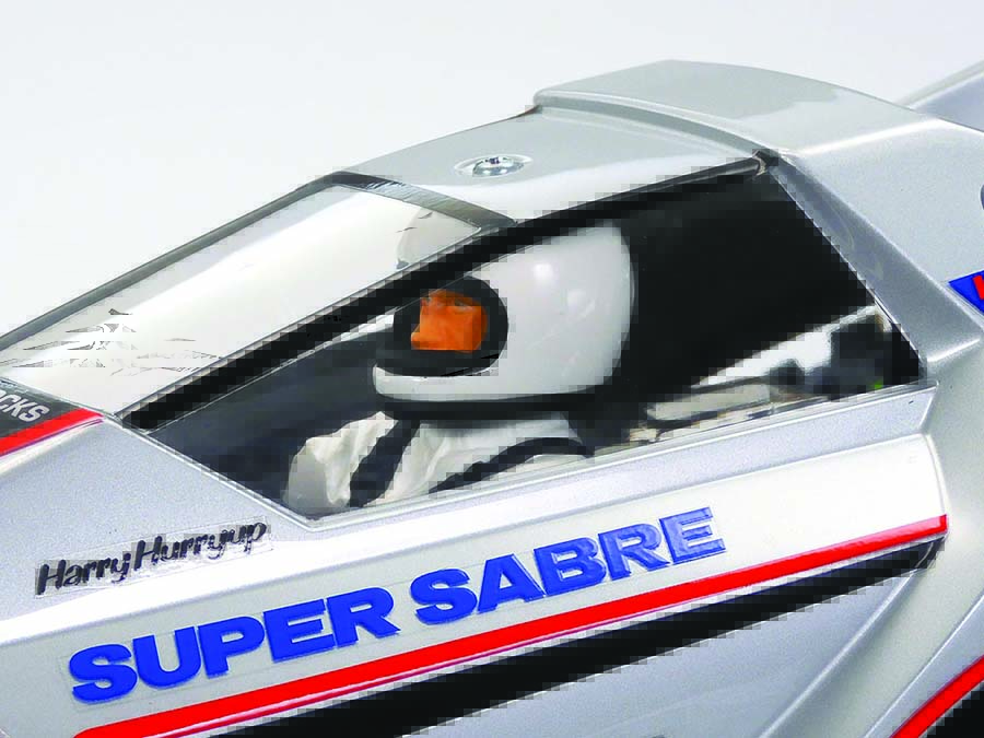 The Super Sabre’s body comes pre-painted but requires stickers to be applied and the driver figure to be completed to finish off its box art look.