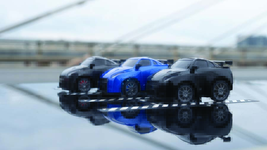 At 1/64 scale, the cartoony FMS ALU35 looks a lot like Choro-Q “Penny Racer” Nissan R35 Skylines. They can be driven sans-camera for a more traditional RC driving experience.